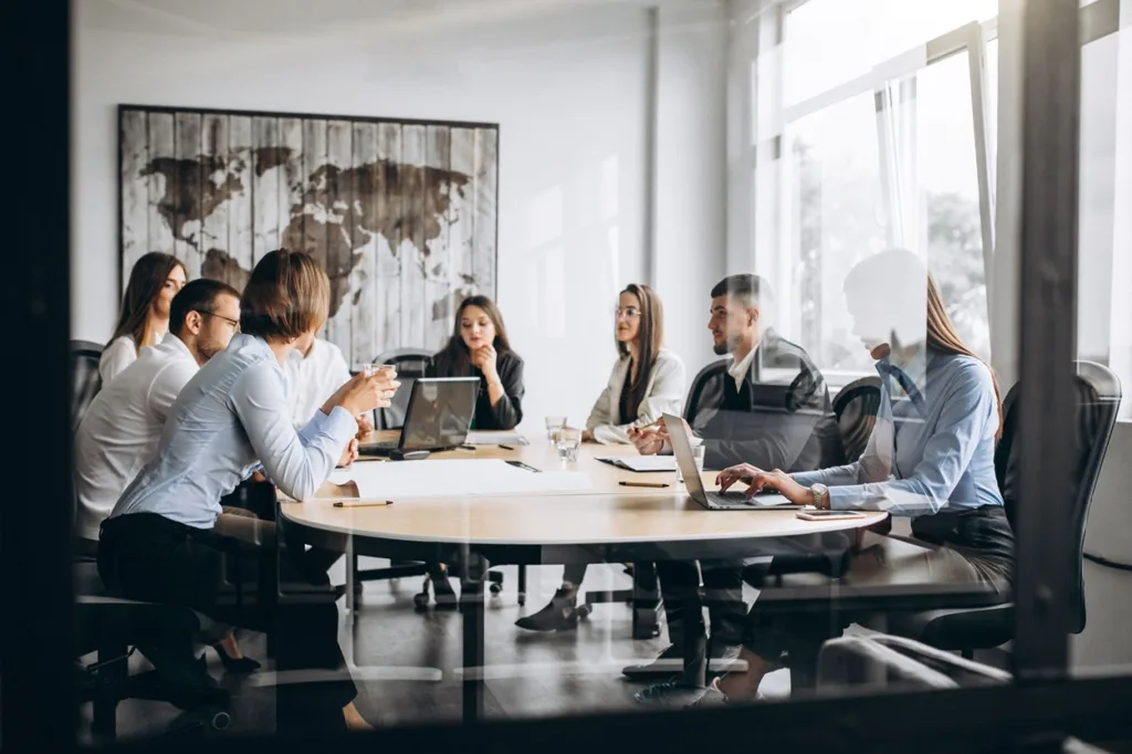 hr professionals speaking in a meeting room